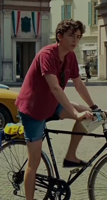 Elio im roten Hemd auf dem Velo
